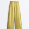 Pantalon large 100 % lin avec plis latéraux Pantalon large 100 % lin avec plis latéraux
