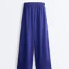 Pantalon large 100 % lin avec plis latéraux Pantalon large 100 % lin avec plis latéraux