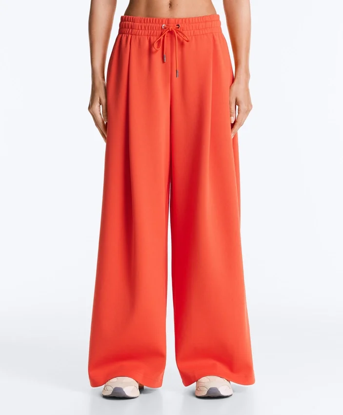 Pantalon large en coton piqué plissé Pantalon large en coton piqué plissé