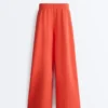 Pantalon large en coton piqué plissé Pantalon large en coton piqué plissé