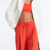 Pantalon large en coton piqué plissé Pantalon large en coton piqué plissé