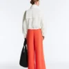 Pantalon large en coton piqué plissé Pantalon large en coton piqué plissé