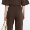 Pantalon slim taille basse en piqué de coton Pantalon slim taille basse en piqué de coton