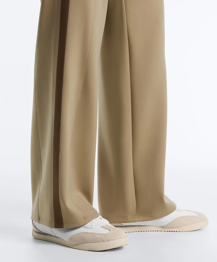 Pantalon à taille haute et coupe droite effet néoprène avec passepoil Pantalon à taille haute et coupe droite effet néoprène avec passepoil