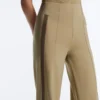 Pantalon à taille haute et coupe droite effet néoprène avec passepoil Pantalon à taille haute et coupe droite effet néoprène avec passepoil