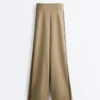 Pantalon à taille haute et coupe droite effet néoprène avec passepoil Pantalon à taille haute et coupe droite effet néoprène avec passepoil