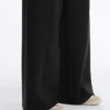 Pantalon à taille haute et jambes larges effet néoprène Pantalon à taille haute et jambes larges effet néoprène