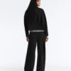 Pantalon à taille haute et jambes larges effet néoprène Pantalon à taille haute et jambes larges effet néoprène