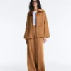 Pantalon à taille haute et jambes larges effet néoprène Pantalon à taille haute et jambes larges effet néoprène