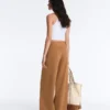 Pantalon à taille haute et jambes larges effet néoprène Pantalon à taille haute et jambes larges effet néoprène