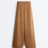 Pantalon à taille haute et jambes larges effet néoprène Pantalon à taille haute et jambes larges effet néoprène