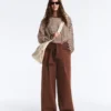 Pantalon à taille haute et jambes larges en piqué de coton Pantalon à taille haute et jambes larges en piqué de coton