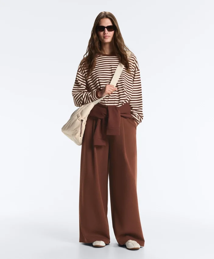 Pantalon à taille haute et jambes larges en piqué de coton Pantalon à taille haute et jambes larges en piqué de coton