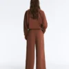 Pantalon à taille haute et jambes larges en piqué de coton Pantalon à taille haute et jambes larges en piqué de coton