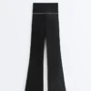 Pantalon évasé taille haute Comfortlux avec nœud Pantalon évasé taille haute Comfortlux avec nœud