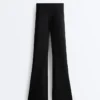 Pantalon évasé taille haute effet néoprène Pantalon évasé taille haute effet néoprène