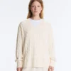 Pull à col en V en maille torsadée 100 % coton Pull à col en V en maille torsadée 100 % coton