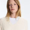 Pull à col en V en maille torsadée 100 % coton Pull à col en V en maille torsadée 100 % coton