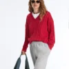 Pull à col en V en maille torsadée 100 % coton Pull à col en V en maille torsadée 100 % coton