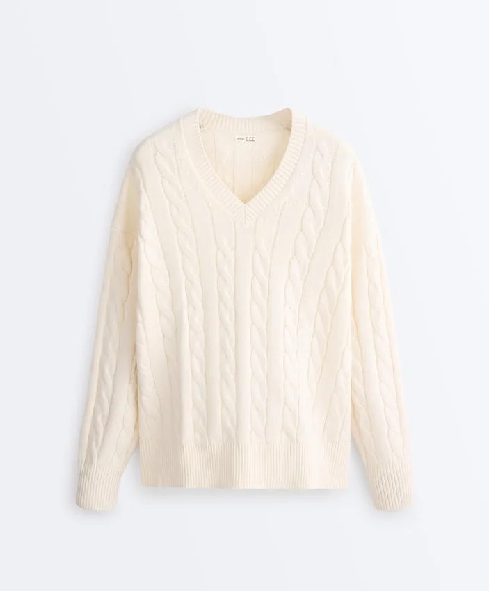 Pull à col en V en maille torsadée 100 % coton Pull à col en V en maille torsadée 100 % coton