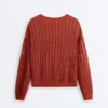 Pull en maille ajourée à côtes Pull en maille ajourée à côtes