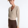 Pull en maille côtelée croisée