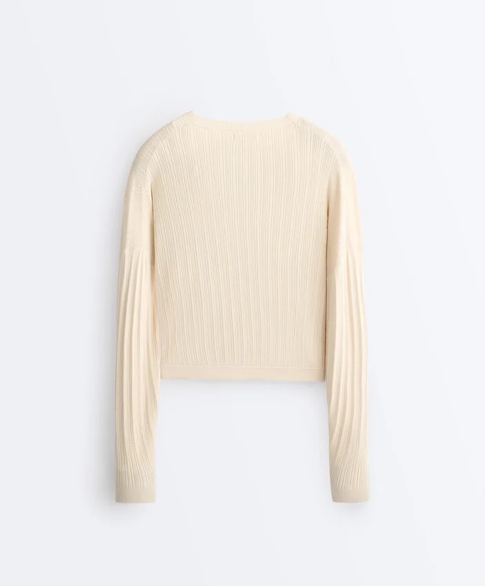 Pull en maille côtelée croisée Pull en maille côtelée croisée