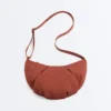 Sac à bandoulière matelassé texturé Sac à bandoulière matelassé texturé