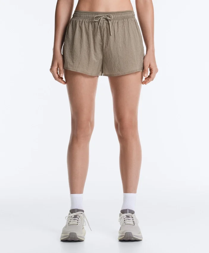 Short technique 2-en-1 à carreaux et taille mi-haute Short technique 2-en-1 à carreaux et taille mi-haute