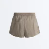 Short technique 2-en-1 à carreaux et taille mi-haute Short technique 2-en-1 à carreaux et taille mi-haute