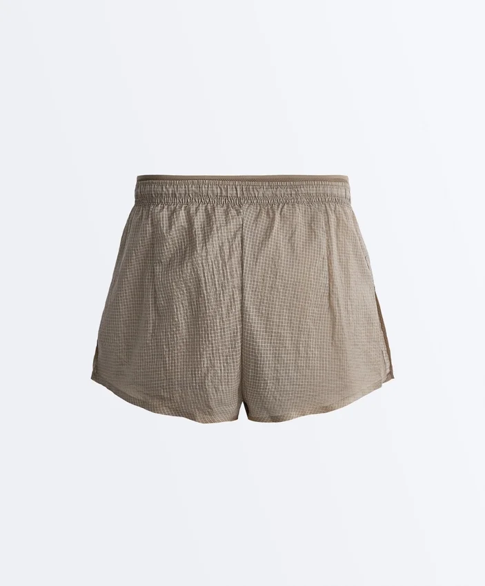 Short technique 2-en-1 à carreaux et taille mi-haute Short technique 2-en-1 à carreaux et taille mi-haute