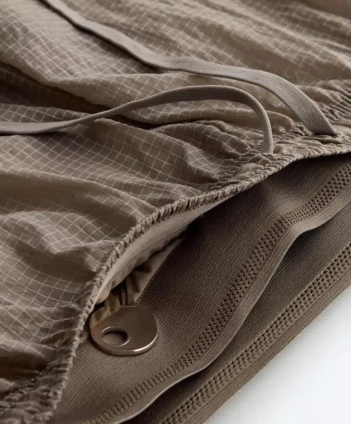 Short technique 2-en-1 à carreaux et taille mi-haute Short technique 2-en-1 à carreaux et taille mi-haute