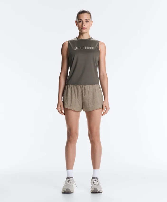 Short technique 2-en-1 à carreaux et taille mi-haute Short technique 2-en-1 à carreaux et taille mi-haute