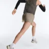 Short technique 2-en-1 à carreaux et taille mi-haute Short technique 2-en-1 à carreaux et taille mi-haute
