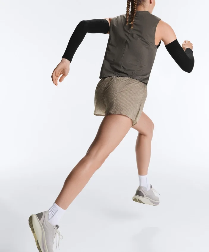 Short technique 2-en-1 à carreaux et taille mi-haute Short technique 2-en-1 à carreaux et taille mi-haute