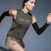 Short technique 2-en-1 à carreaux et taille mi-haute Short technique 2-en-1 à carreaux et taille mi-haute