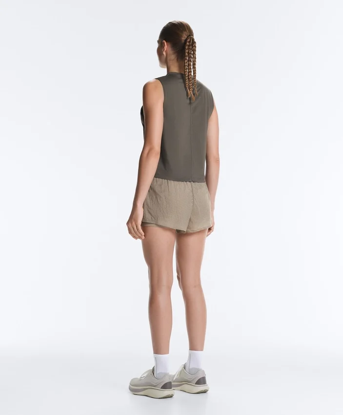 Short technique 2-en-1 à carreaux et taille mi-haute Short technique 2-en-1 à carreaux et taille mi-haute