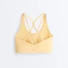 Soutien-gorge de sport Comfortlux à maintien moyen avec bonnets Soutien-gorge de sport Comfortlux à maintien moyen avec bonnets