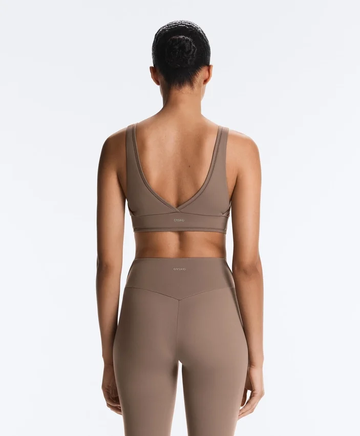 Soutien-gorge de sport Comfortlux à maintien moyen avec ourlet ajouré Soutien-gorge de sport Comfortlux à maintien moyen avec ourlet ajouré