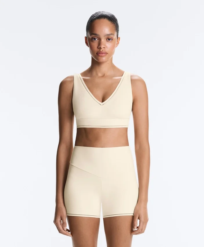 Soutien-gorge de sport Comfortlux à maintien moyen avec ourlet ajouré Soutien-gorge de sport Comfortlux à maintien moyen avec ourlet ajouré