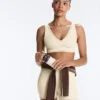 Soutien-gorge de sport Comfortlux à maintien moyen avec ourlet ajouré Soutien-gorge de sport Comfortlux à maintien moyen avec ourlet ajouré