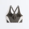 Soutien-gorge de sport compressif à maintien ferme et détails réfléchissants Soutien-gorge de sport compressif à maintien ferme et détails réfléchissants