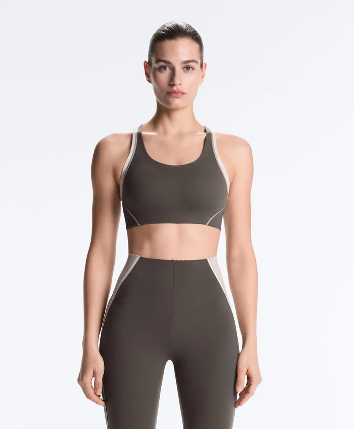 Soutien-gorge de sport compressif à maintien ferme et détails réfléchissants Soutien-gorge de sport compressif à maintien ferme et détails réfléchissants