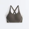 Soutien-gorge de sport compressif à maintien ferme et détails réfléchissants Soutien-gorge de sport compressif à maintien ferme et détails réfléchissants