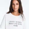 T-shirt ample à manches courtes en mélange de coton avec slogan T-shirt ample à manches courtes en mélange de coton avec slogan