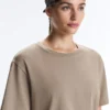 T-shirt ample à manches courtes en mélange de coton avec slogan T-shirt ample à manches courtes en mélange de coton avec slogan