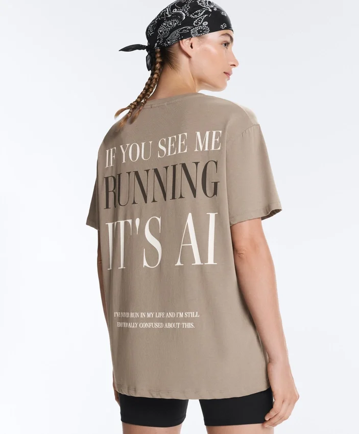 T-shirt ample à manches courtes en mélange de coton avec slogan T-shirt ample à manches courtes en mélange de coton avec slogan