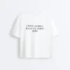 T-shirt ample à manches courtes en mélange de coton avec slogan T-shirt ample à manches courtes en mélange de coton avec slogan