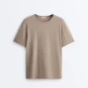 T-shirt ample à manches courtes en mélange de coton avec slogan T-shirt ample à manches courtes en mélange de coton avec slogan