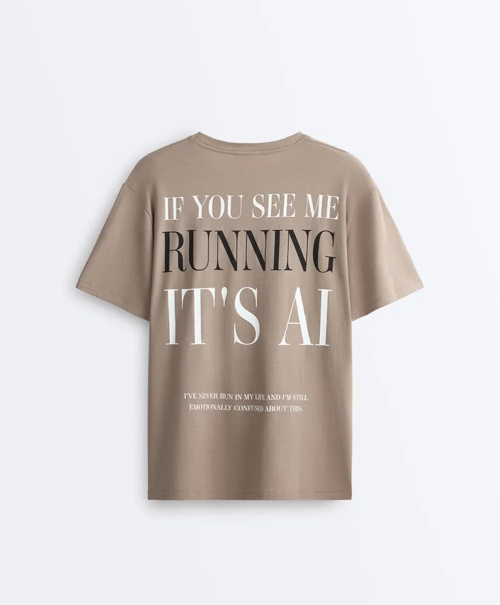 T-shirt ample à manches courtes en mélange de coton avec slogan T-shirt ample à manches courtes en mélange de coton avec slogan